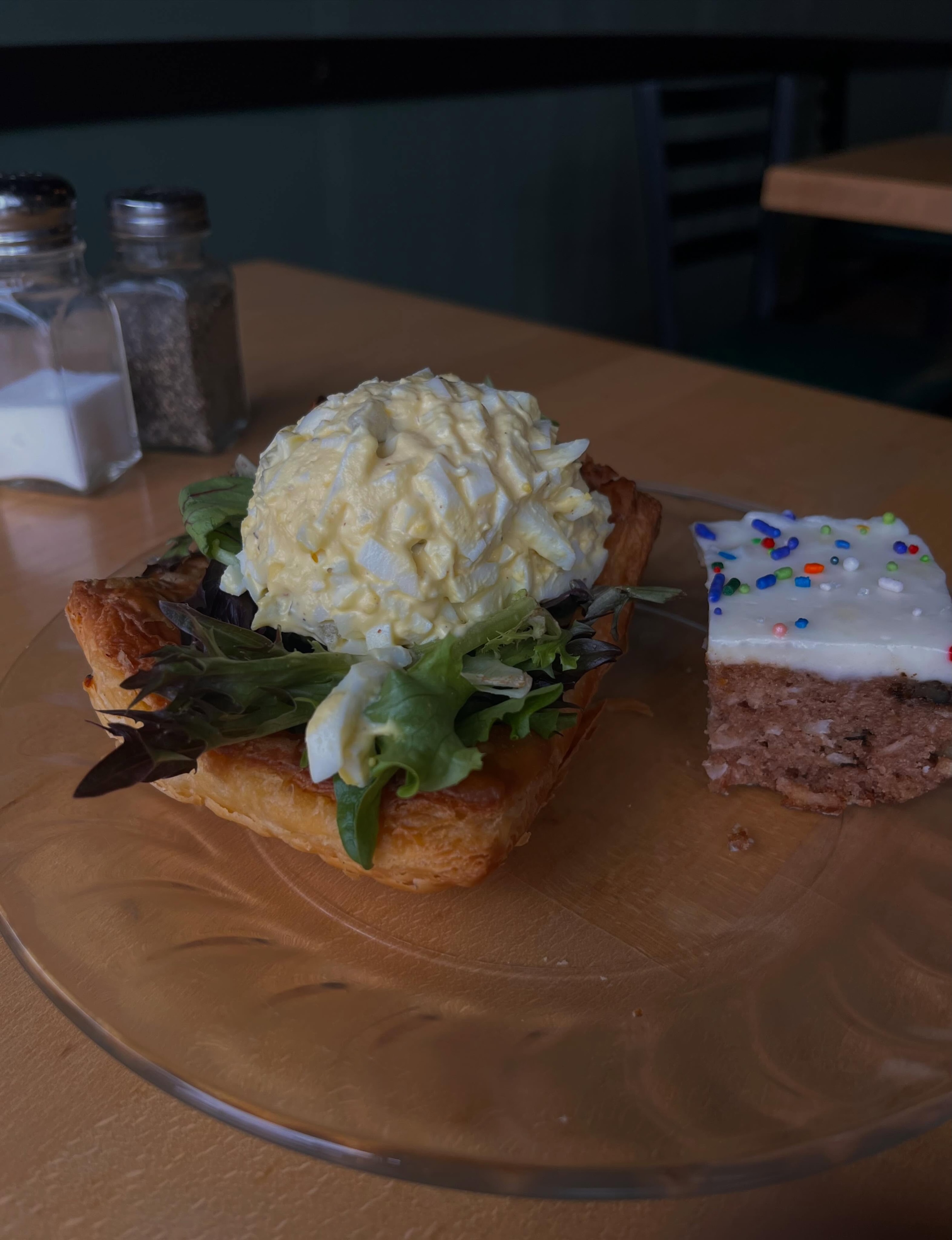 Egg salad on pastry with a bar cookie